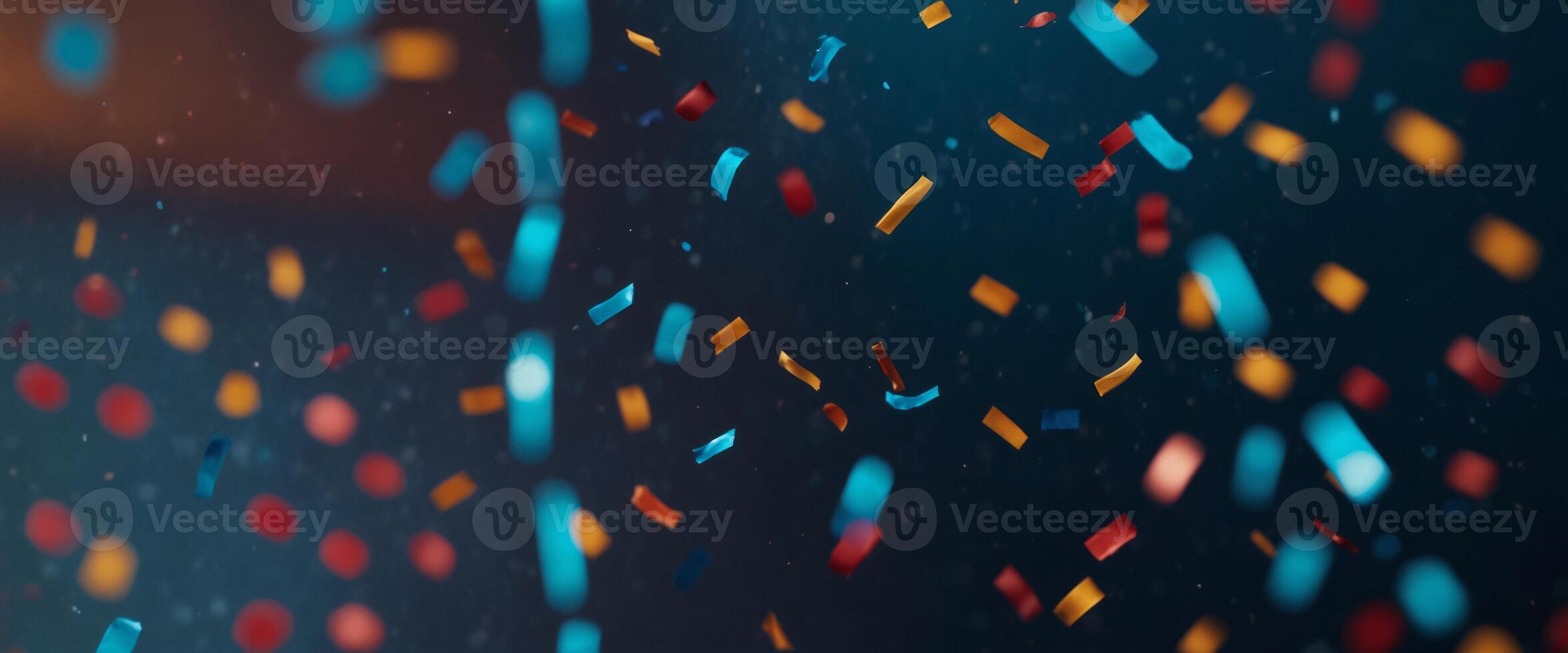 colorful confetti falling on a holiday on a blue background. photo