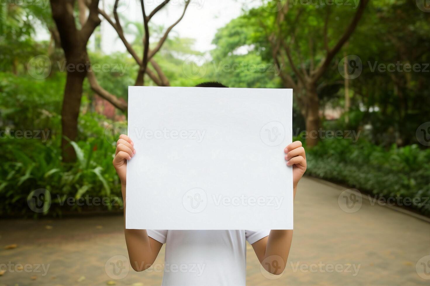 child hand hold blank paper photo