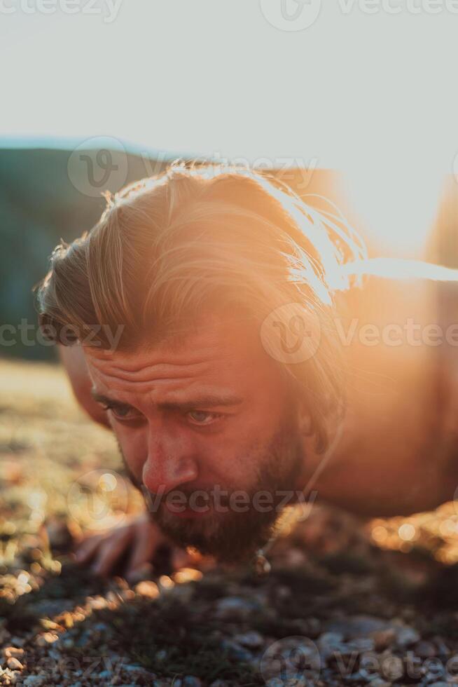 Athlete doing push-ups in the early morning. The concept of a healthy life photo
