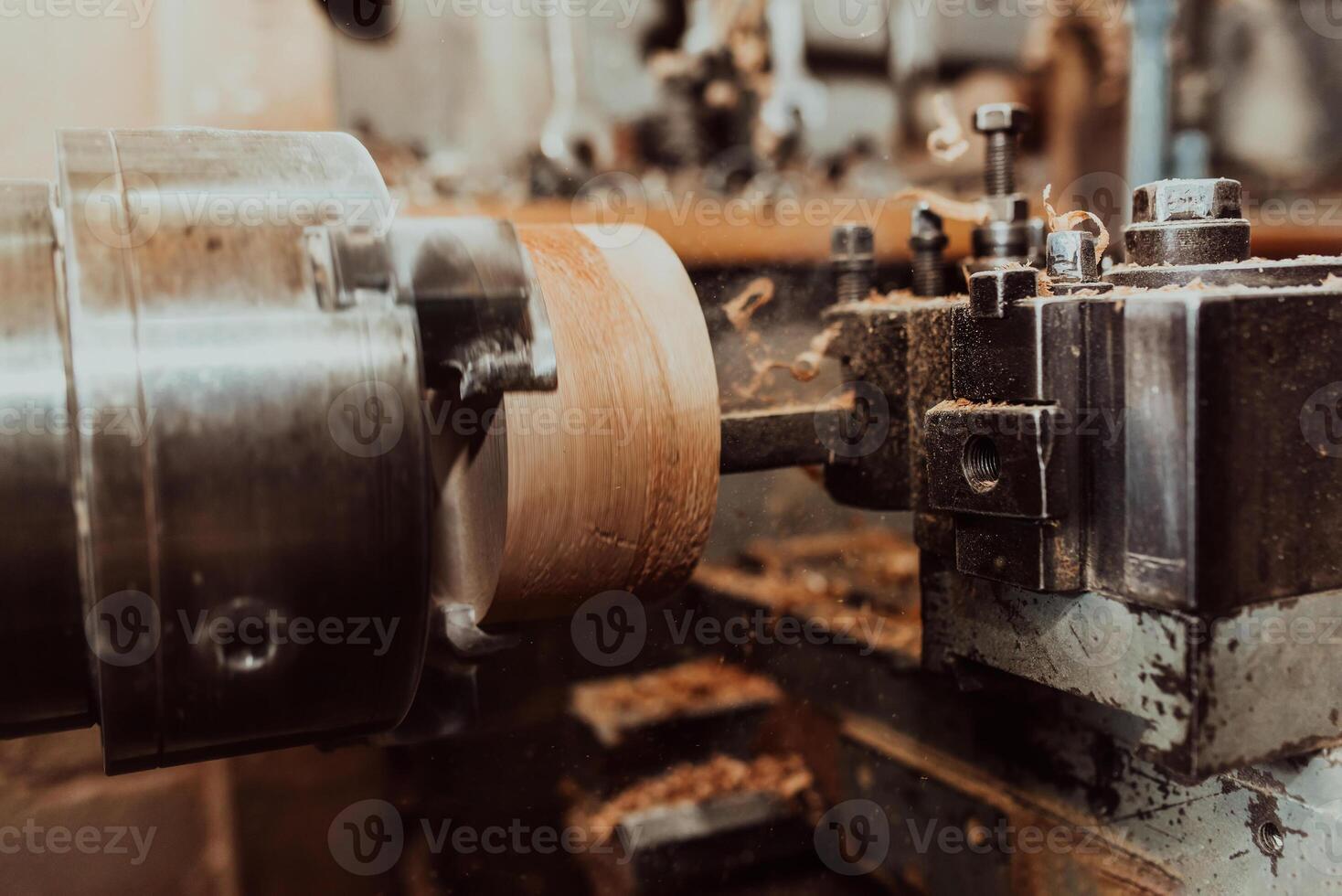 Close-up photo of a lathe working on wood. Mechanical processing of wood