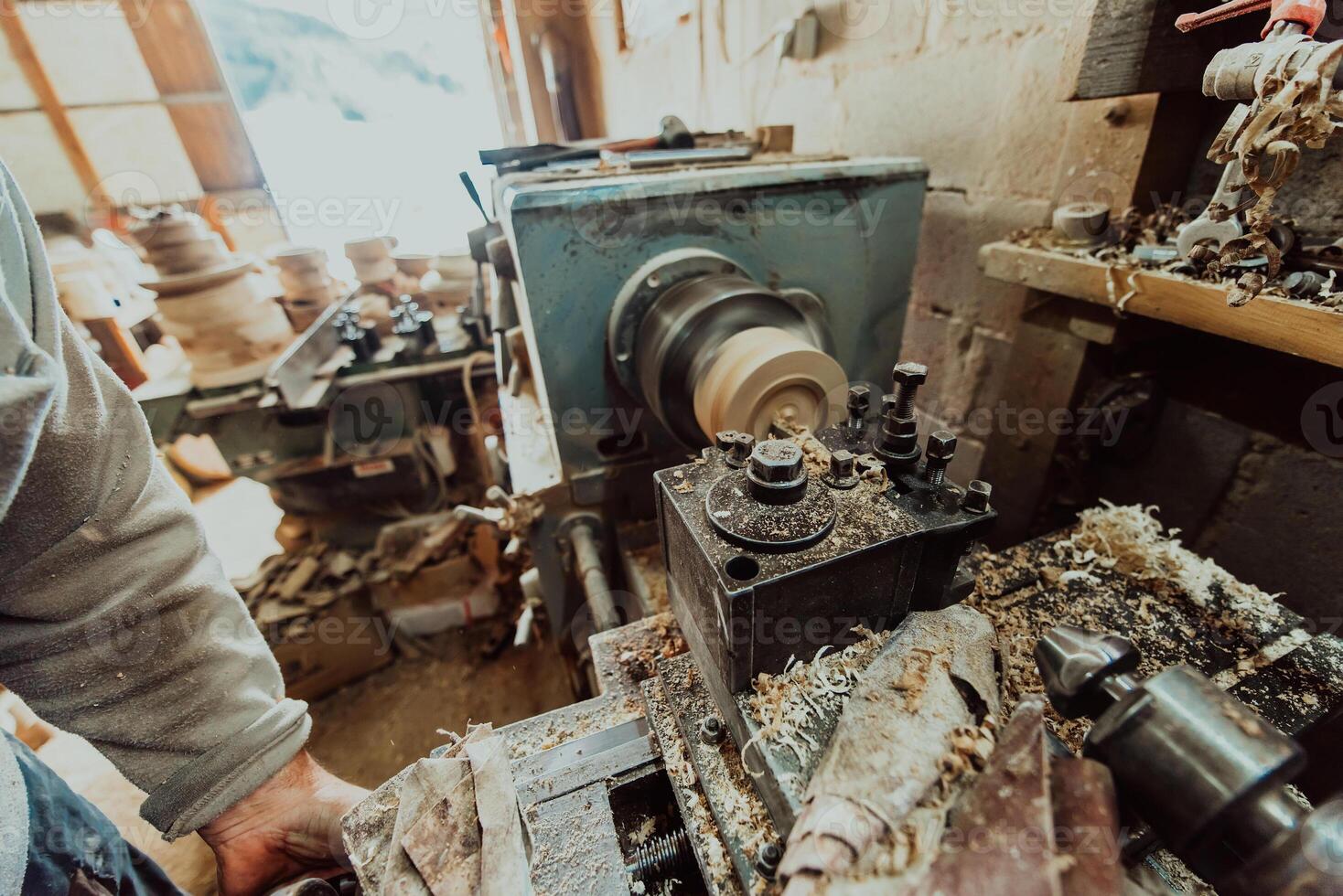 Close-up photo of a lathe working on wood. Mechanical processing of wood