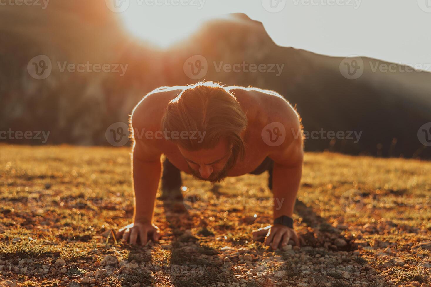 Athlete doing push-ups in the early morning. The concept of a healthy life photo