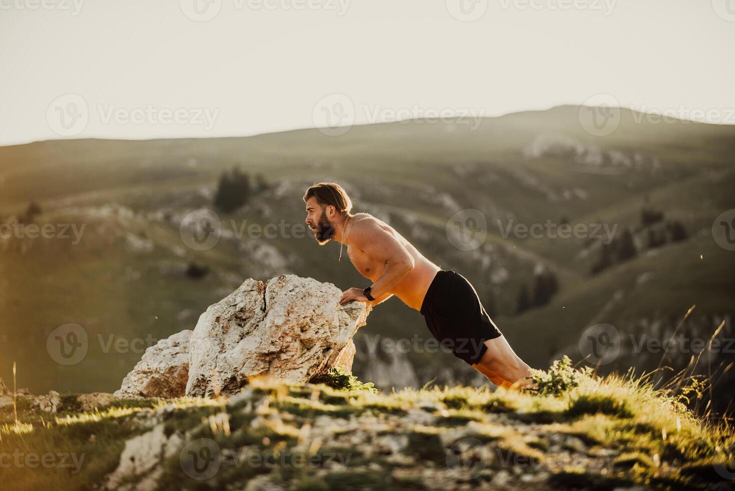 Athlete doing push-ups in the early morning. The concept of a healthy life photo