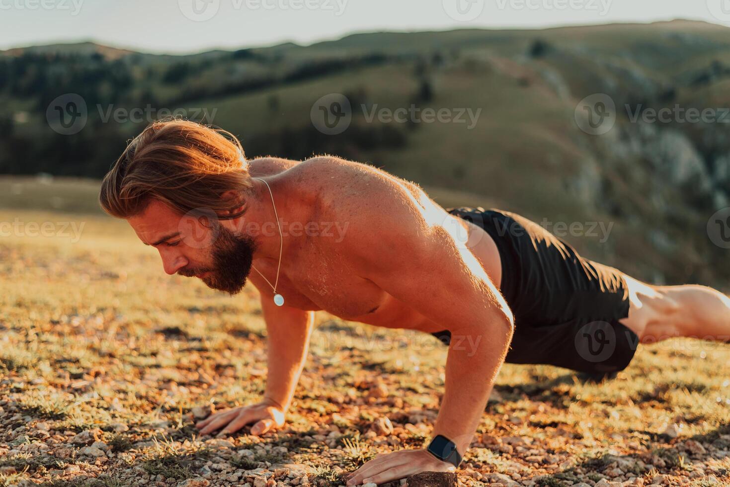 Athlete doing push-ups in the early morning. The concept of a healthy life photo