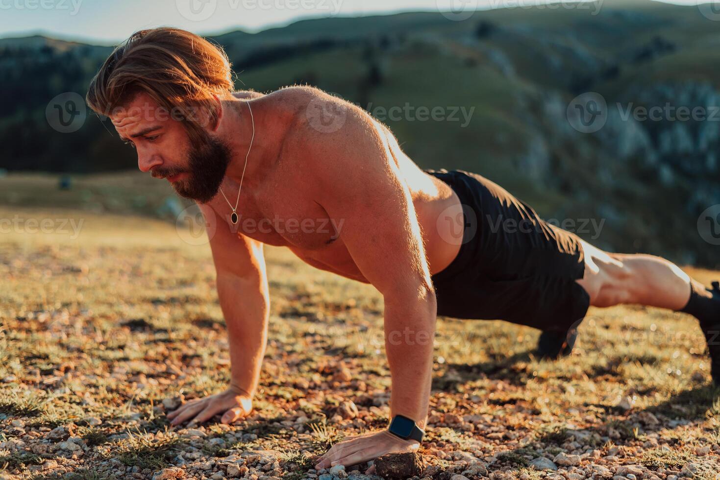 Athlete doing push-ups in the early morning. The concept of a healthy life photo