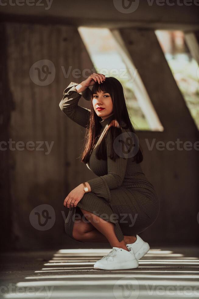 A confident and stylish plus-size woman posing by a modern building in an olive green dress, radiating beauty, empowerment, and self-love. photo
