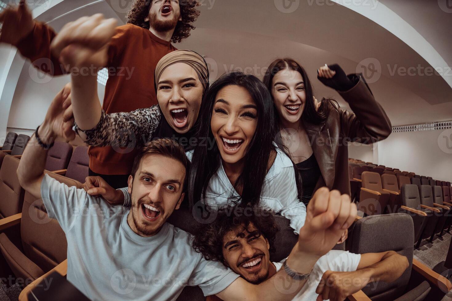In a heartwarming scene, a diverse group of friends gathers around a television, radiating joy and unity as they collectively witness and celebrate a joyful event together. photo