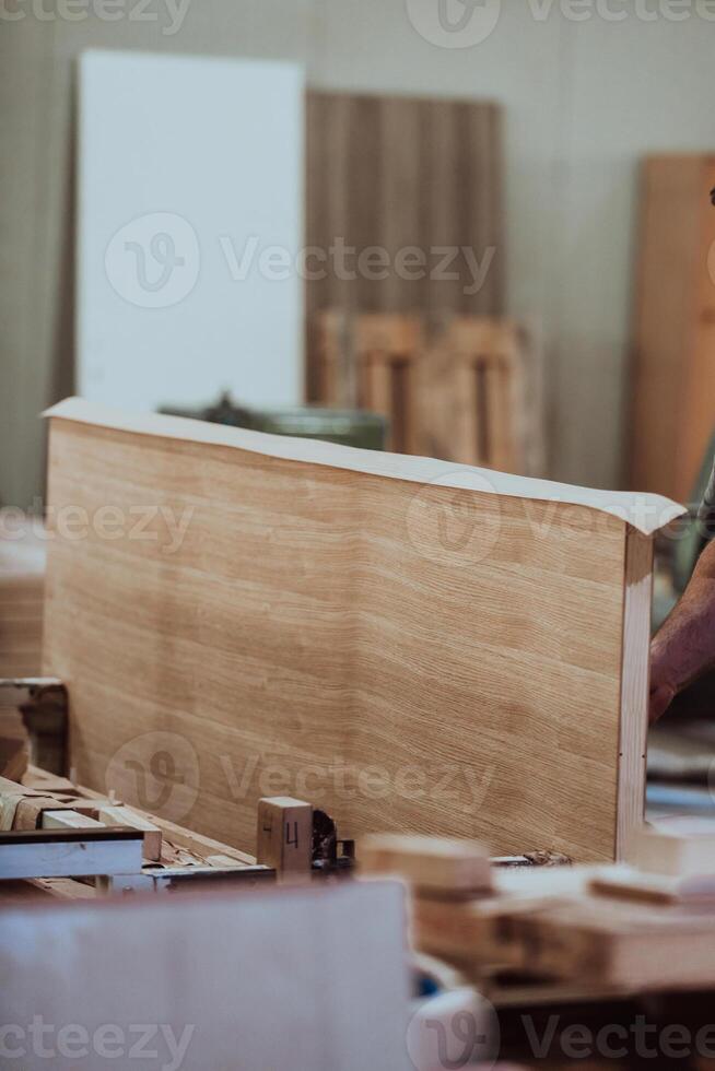 A vast warehouse in the forestry industry, showcasing a plethora of wooden products, including boards and various timber items neatly organized in storage photo