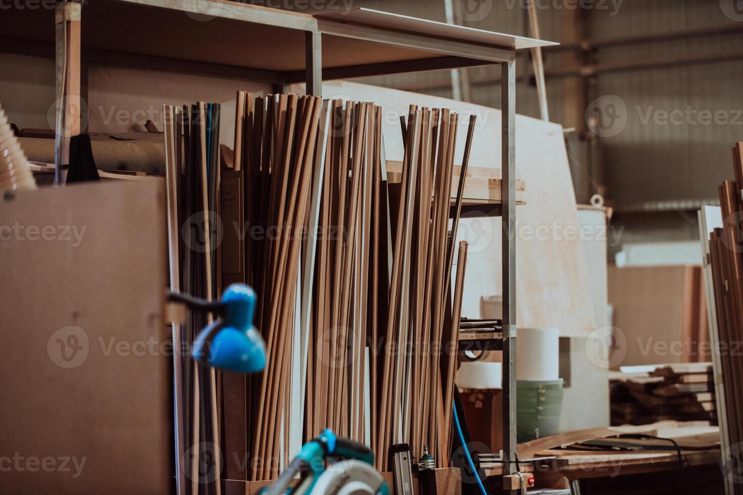 A vast warehouse in the forestry industry, showcasing a plethora of wooden products, including boards and various timber items neatly organized in storage photo