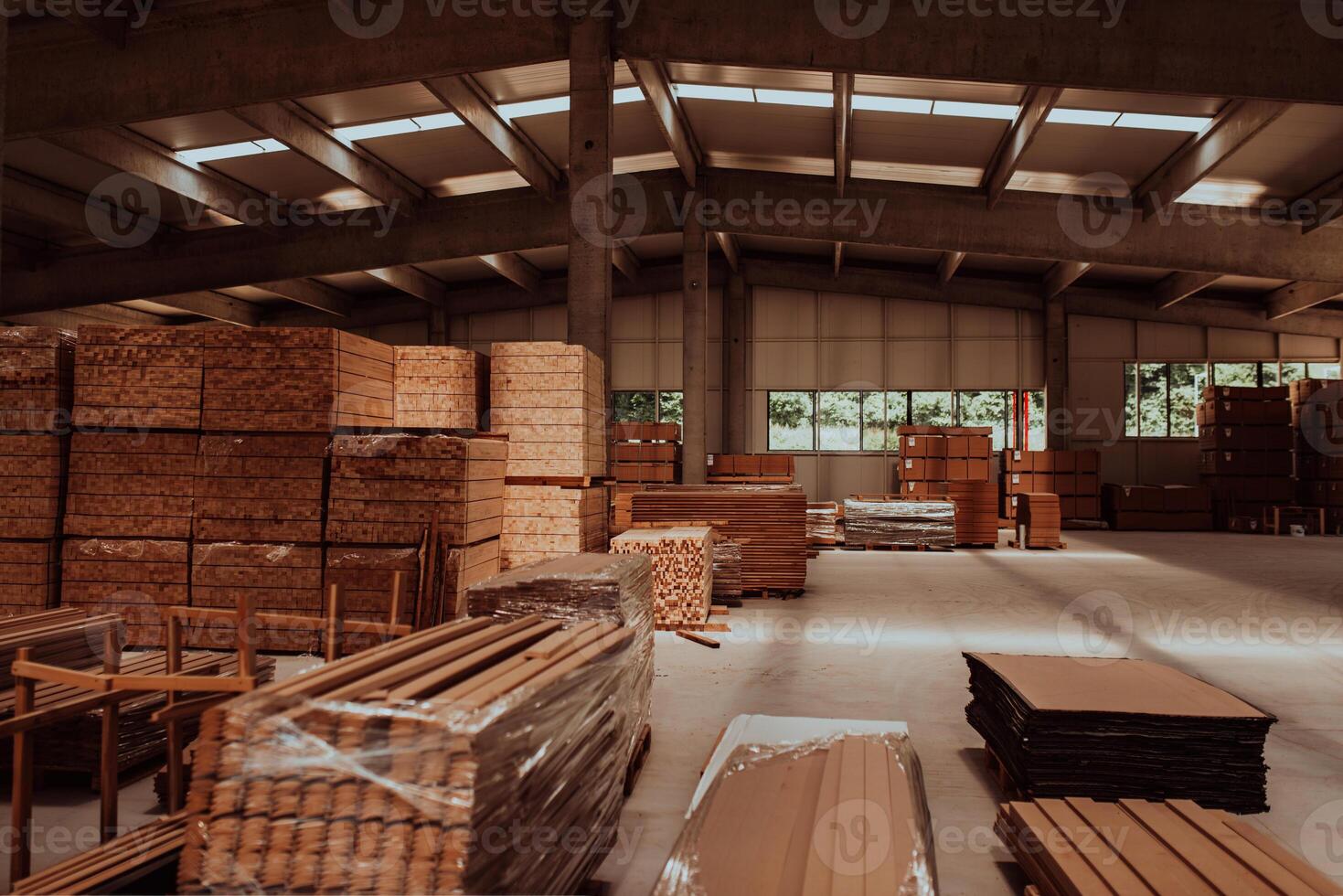 A vast warehouse in the forestry industry, showcasing a plethora of wooden products, including boards and various timber items neatly organized in storage photo