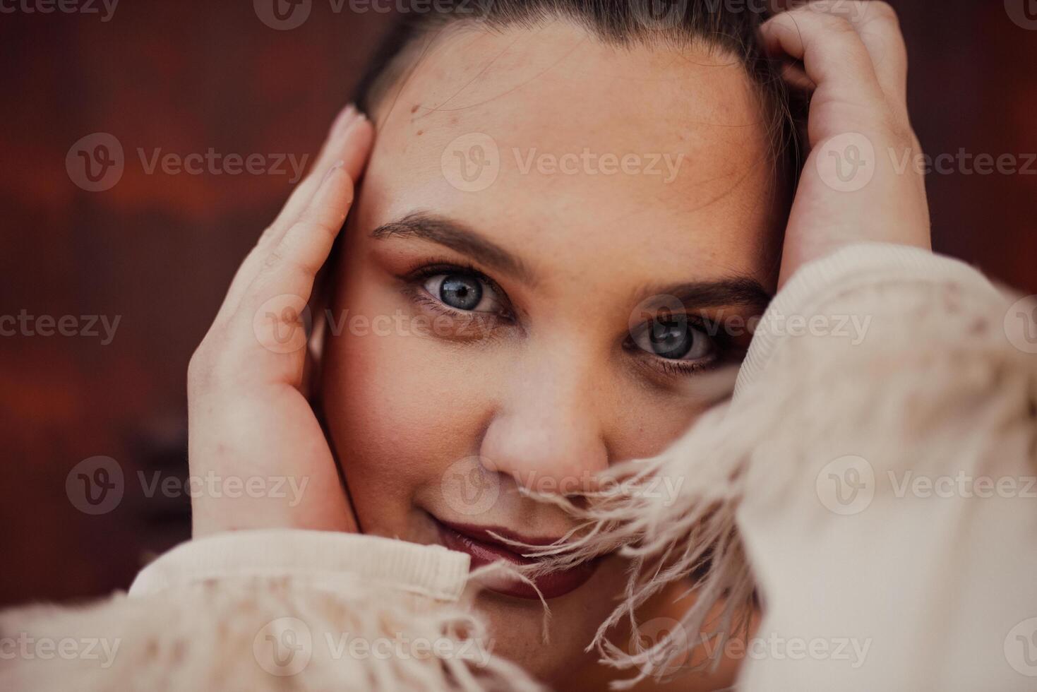 A close-up, unretouched portrait of a naturally beautiful young woman showcasing her authentic and unaltered facial features, capturing the essence of real beauty without any digital enhancements. photo