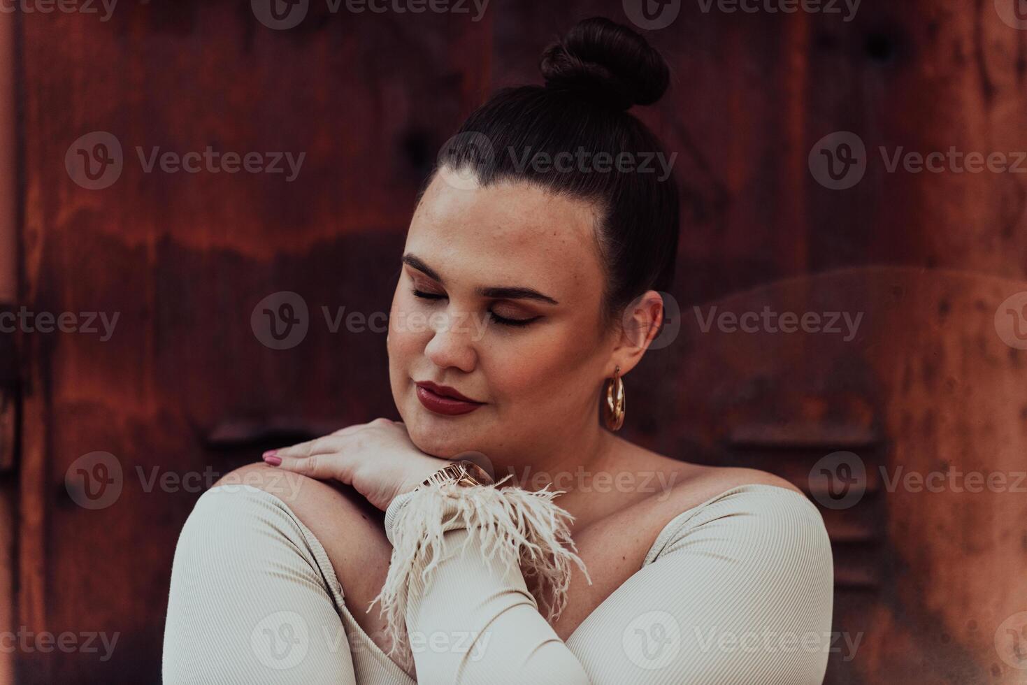 A close-up, unretouched portrait of a naturally beautiful young woman showcasing her authentic and unaltered facial features, capturing the essence of real beauty without any digital enhancements. photo