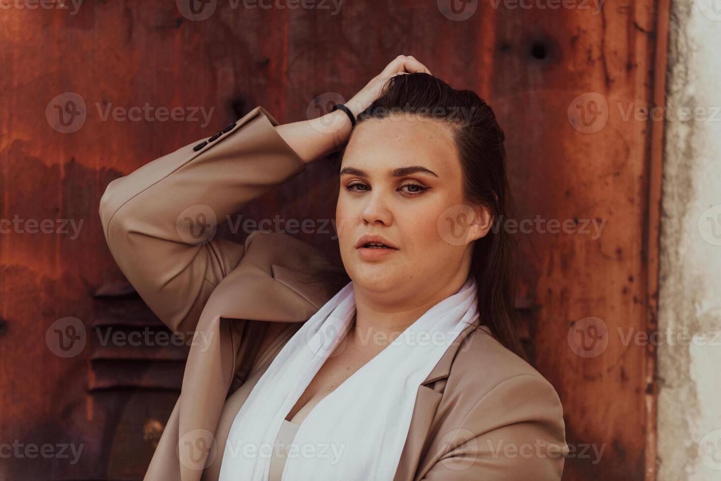 A close-up, unretouched portrait of a naturally beautiful young woman showcasing her authentic and unaltered facial features, capturing the essence of real beauty without any digital enhancements. photo