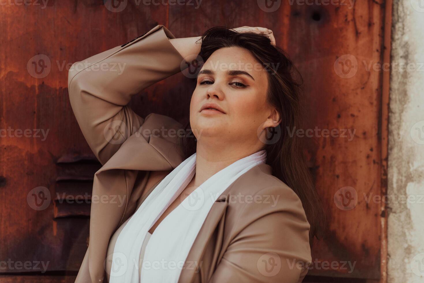 A close-up, unretouched portrait of a naturally beautiful young woman showcasing her authentic and unaltered facial features, capturing the essence of real beauty without any digital enhancements. photo