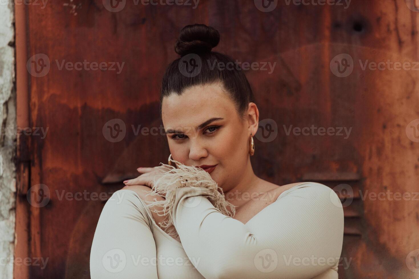 A close-up, unretouched portrait of a naturally beautiful young woman showcasing her authentic and unaltered facial features, capturing the essence of real beauty without any digital enhancements. photo