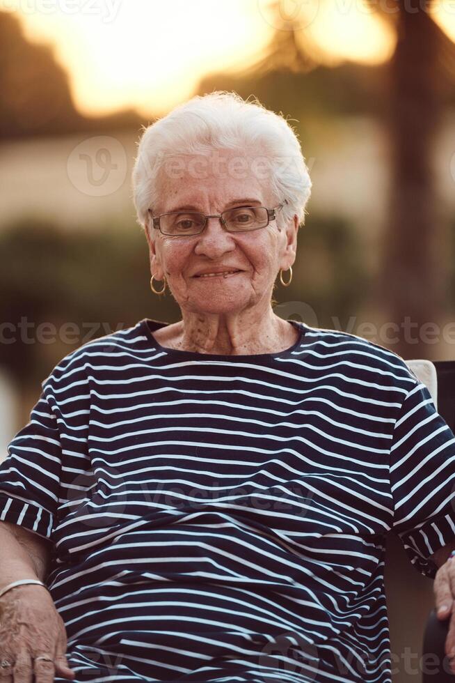 Unfiltered portrait, a real elderly woman sits gracefully in a chair, showcasing the authenticity of aging with wrinkles and a natural face photo