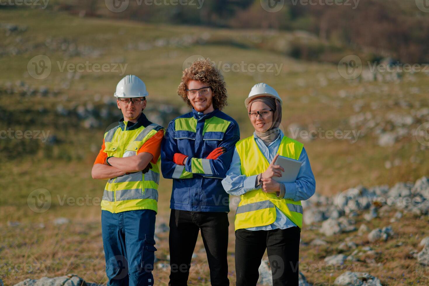 A team of engineers and workers oversees a wind turbine project at a modern wind farm, working together to ensure the efficient generation of renewable energy photo