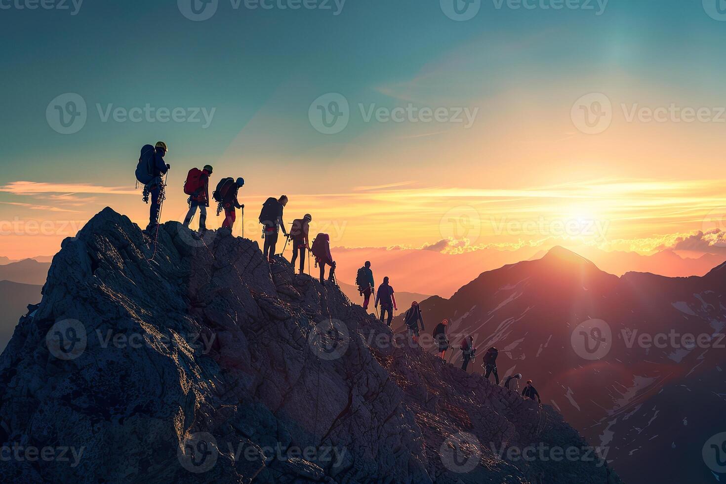 A group of people are hiking up a mountain photo