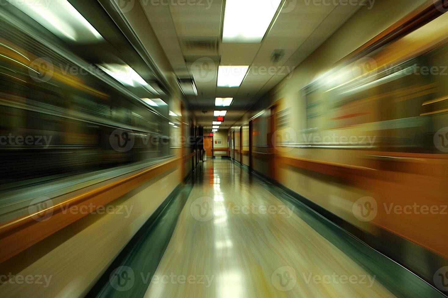 A hallway with a blurry background and a light shining on the floor photo