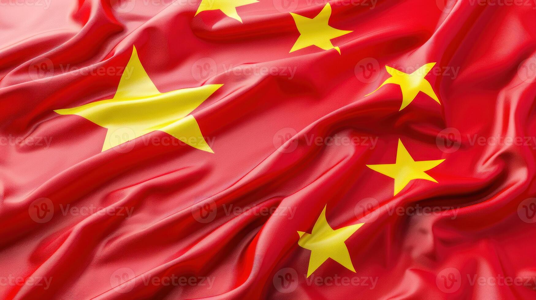 A close-up shot of the Chinese flag with five golden stars, showcasing the red fabrics flowing texture photo