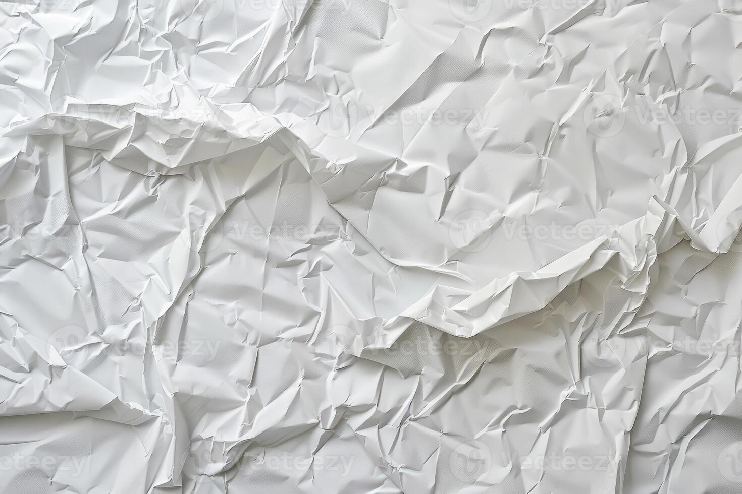 Crumpled white paper texture with rough folds and distressed look photo