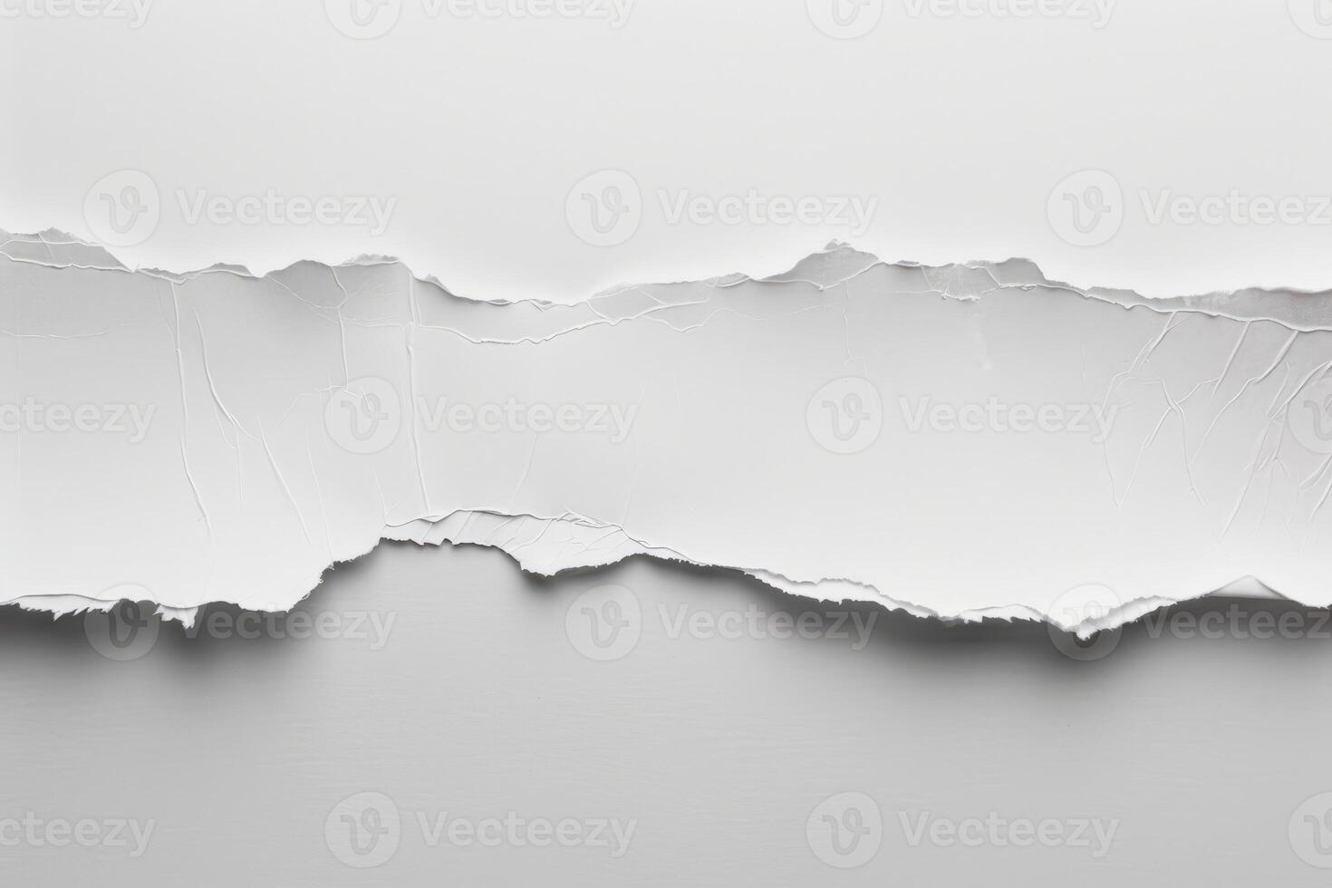 Torn white paper with rough, jagged edges and a minimalistic look photo
