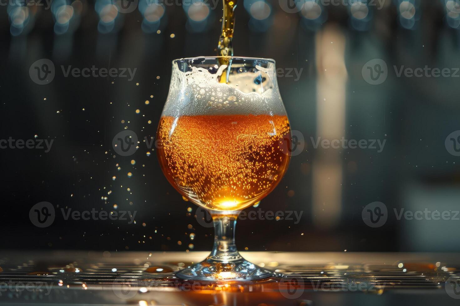 Beer being poured into a glass with splashes and bubbles photo