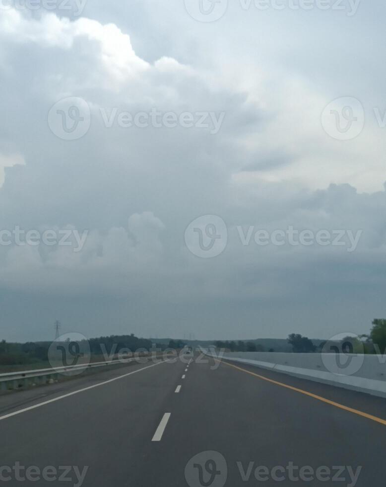clear sky at noon over the highway photo