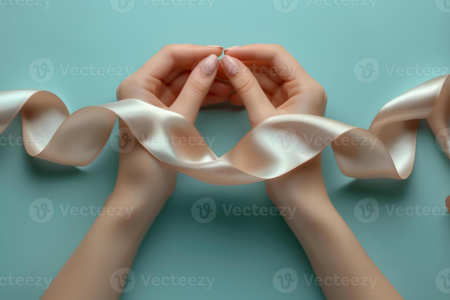 Elegant Hand Arrangement with Luxurious White Satin Ribbon on Turquoise Background for Luxury Design Projects photo