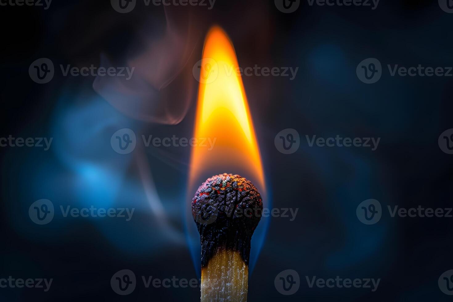 Close-Up of a Burning Matchstick with Flame and Smoke for Conceptual Art and Design photo