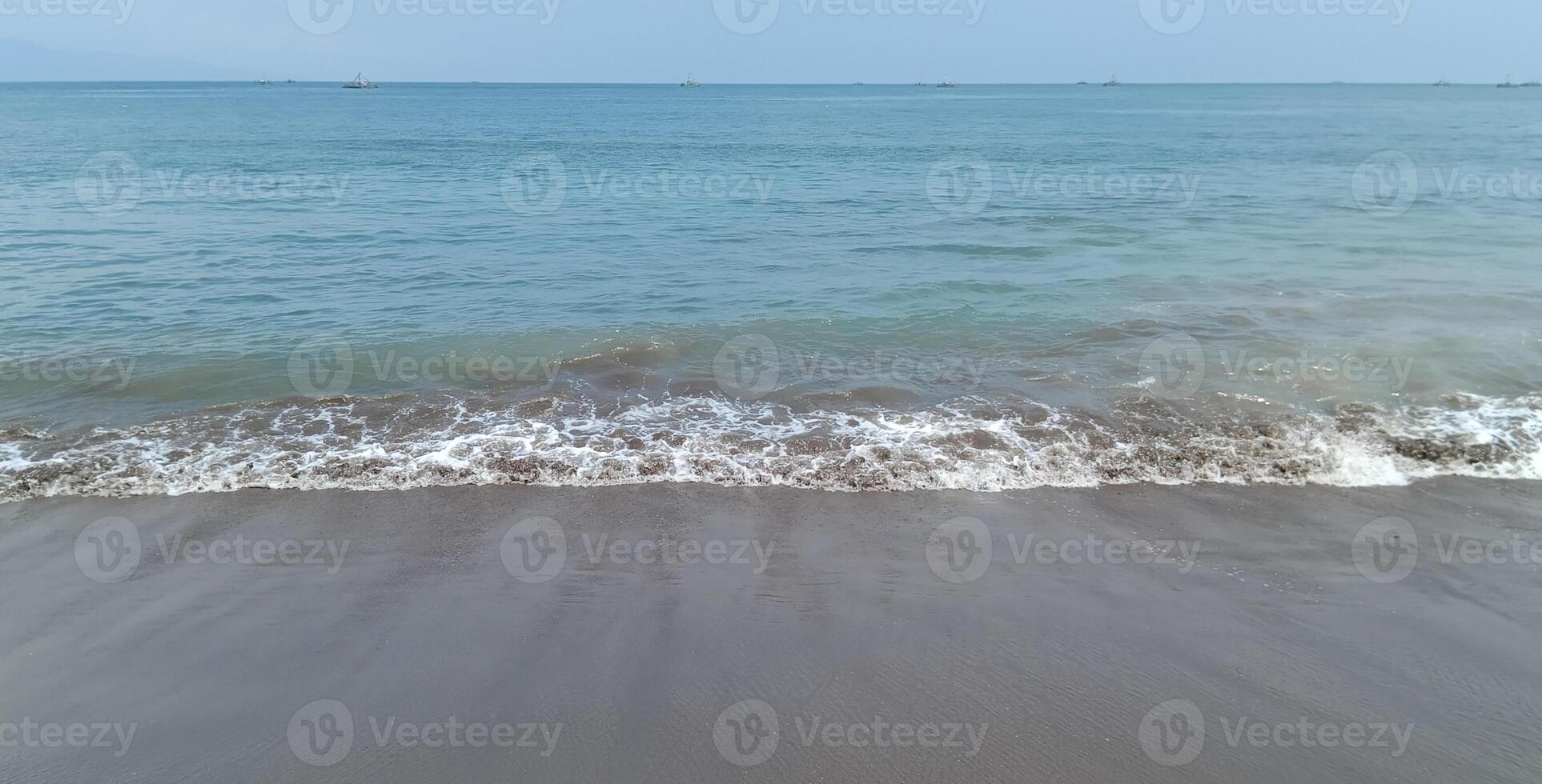 Nature view of the beach and sand in the morning photo