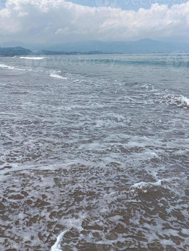 Nature view of the beach and sand in the morning photo