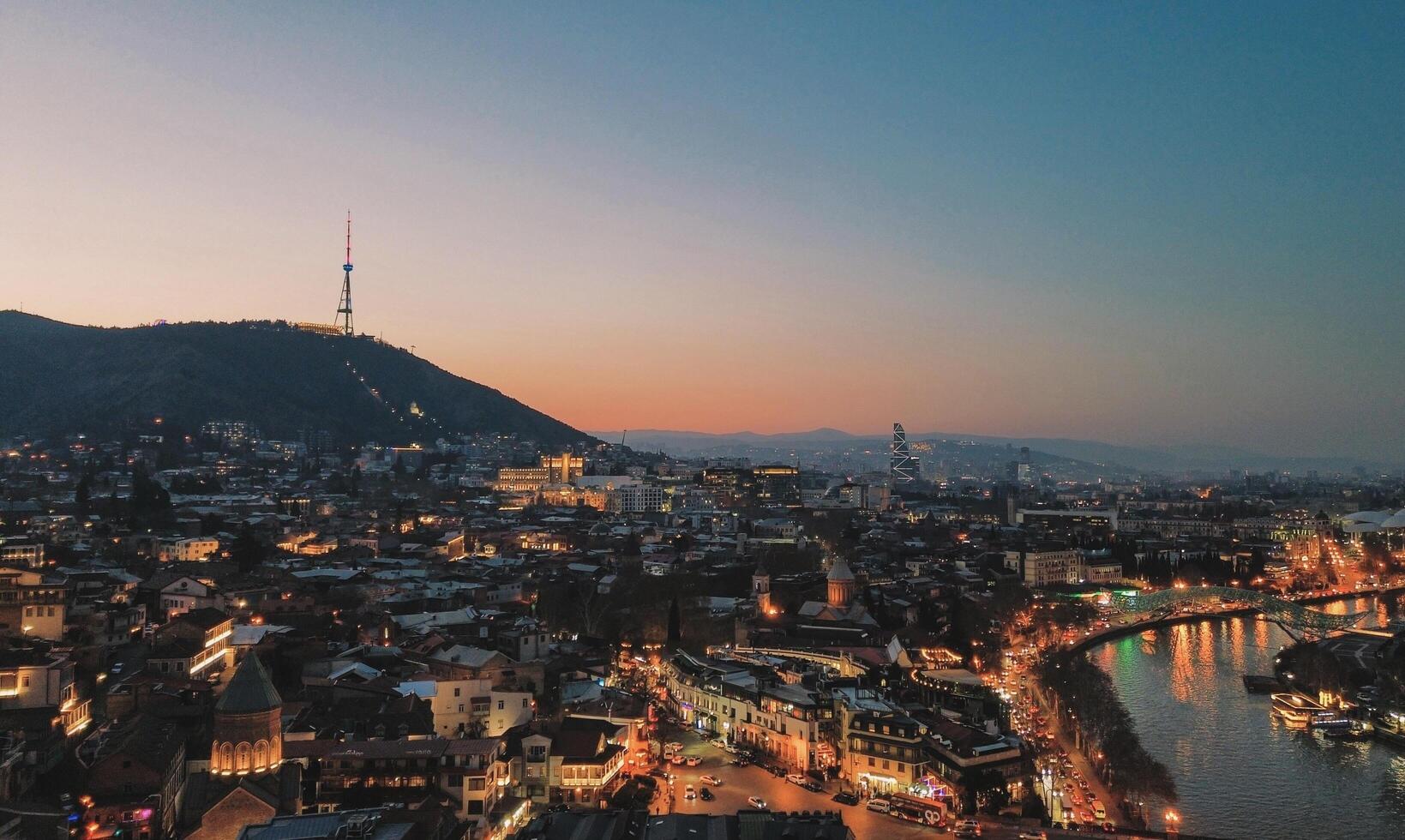 Tbilisi city and landscape of old city view at night with drone photo