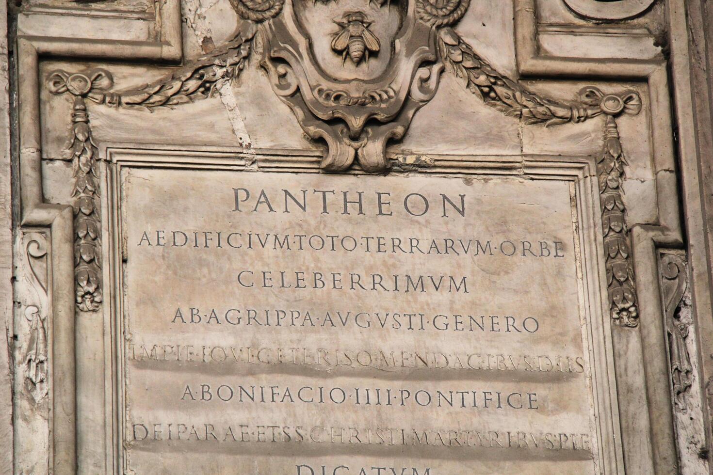 Rome, Italy - September 14 2022 - Inscription Writing on the Wall of Rome Pantheon photo