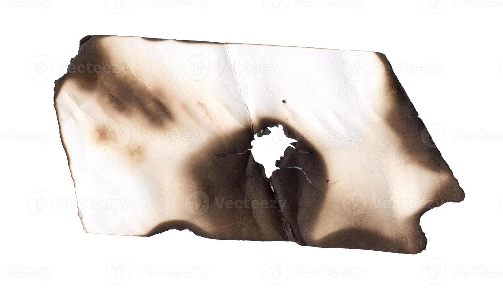 Burnt page on a white background. Vintage burned paper edges heart background photo