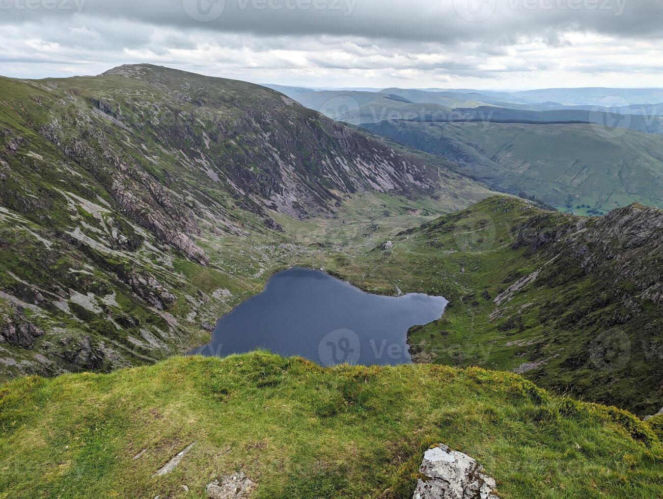 Scenic Mountain View with Lake and Rolling Hills photo