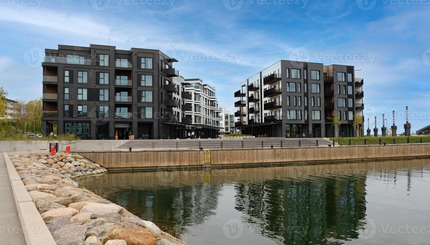 Exterior of modern house in new area of the city. Real estate, residential apartment and office building architecture. photo