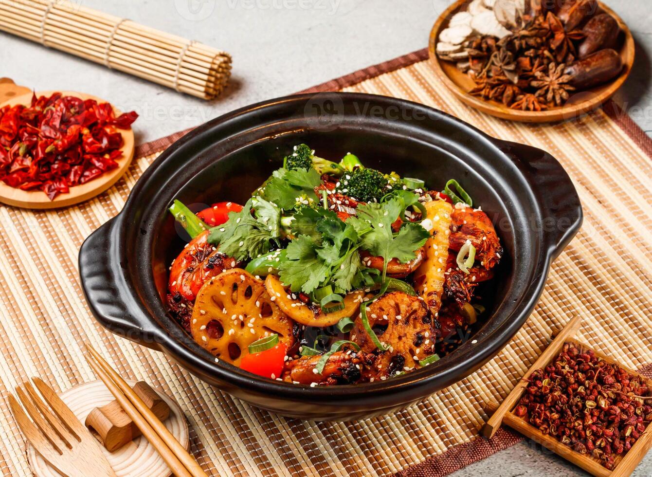 Taiwan Grilled Shrimp with coriander, red chilli, chopsticks and fork served in pot isolated on background side view of taiwanese food photo