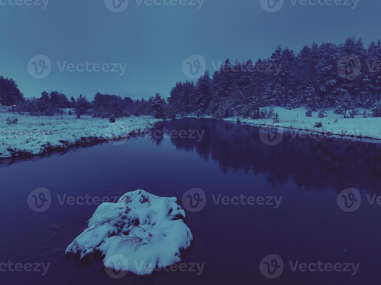 Amazing Cinematic Aerial View On Freezing River. Aerial View Flight Above Frozen Creek Scenic View Of Nature photo