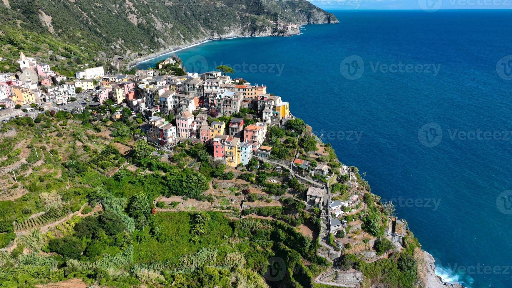 Manarola Village Cinque Terre Coast Italy. colorful town in Liguria one of five Cinque Terre. Manarola traditional Italian village in the National park Cinque Terre, with multicolored houses on rock photo