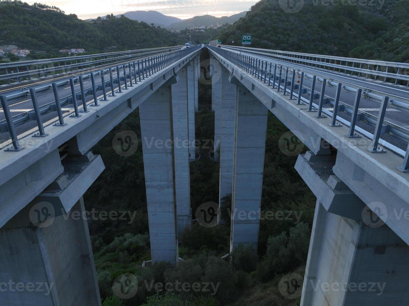 Aerial view on highway bridge in the Italian mountains photo