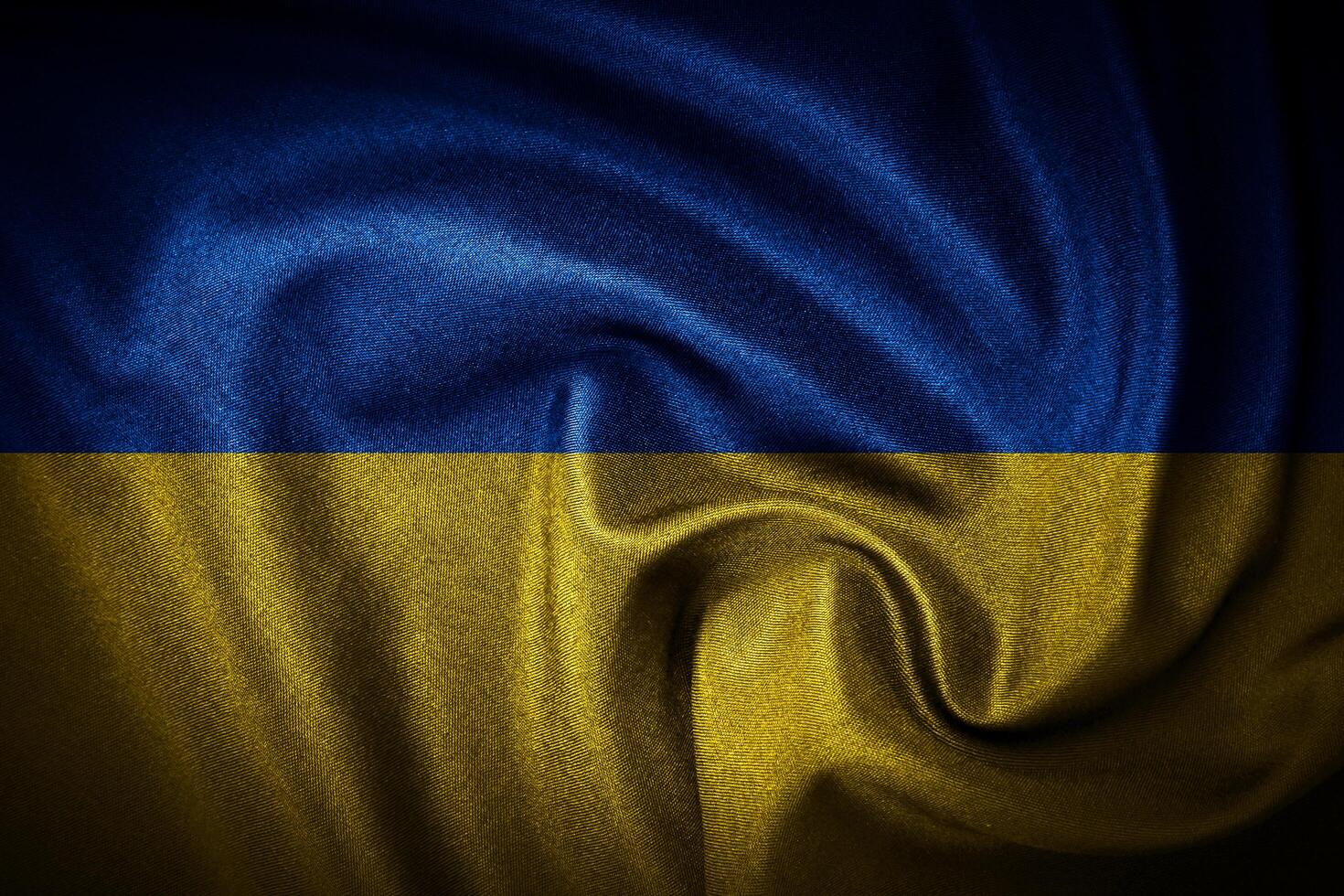 The Ukraine flag consists of two horizontal bands of blue and yellow, symbolizing the sky above and the golden wheat fields below photo
