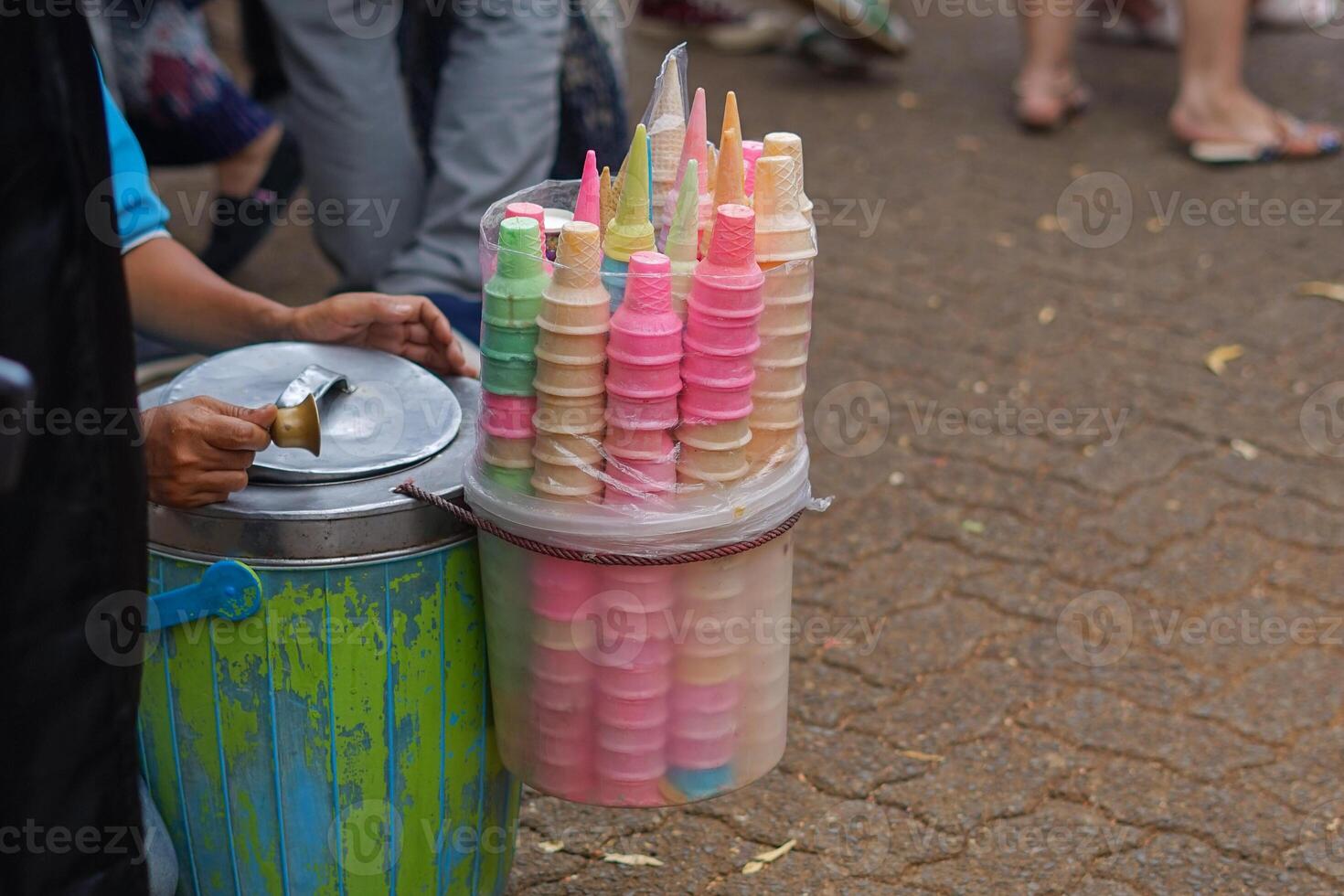 traditional ice cream seller with colorful cones photo
