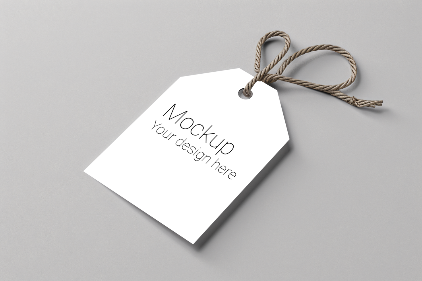 Mockup of label tag with rope on gray background psd