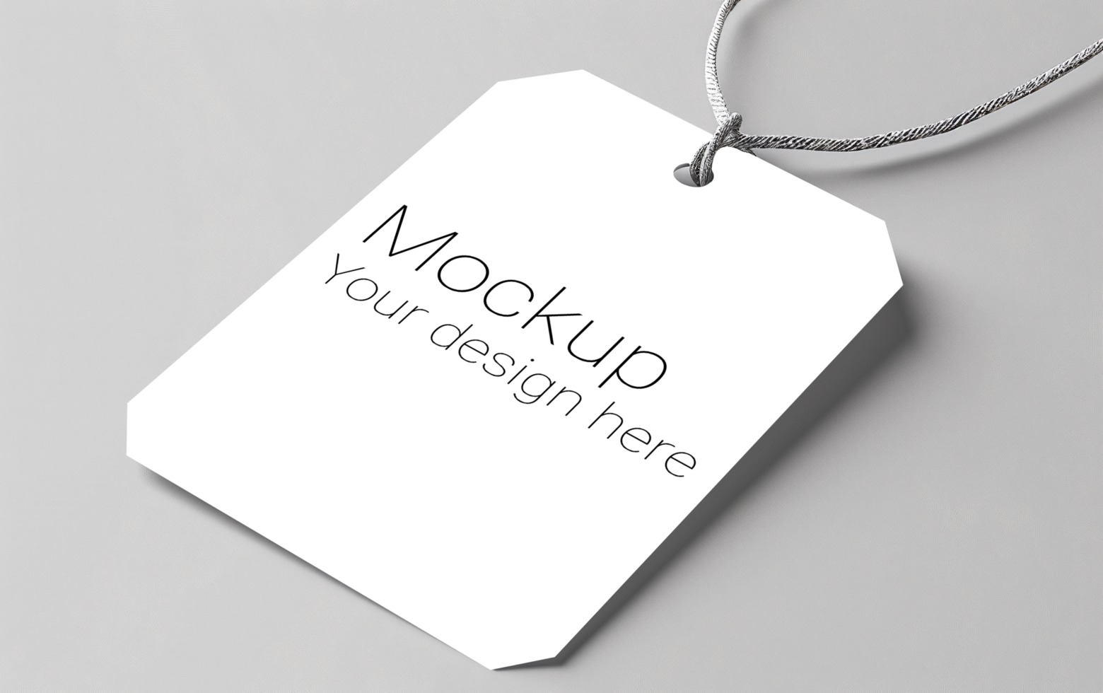 Mockup of label tag with rope on gray background psd