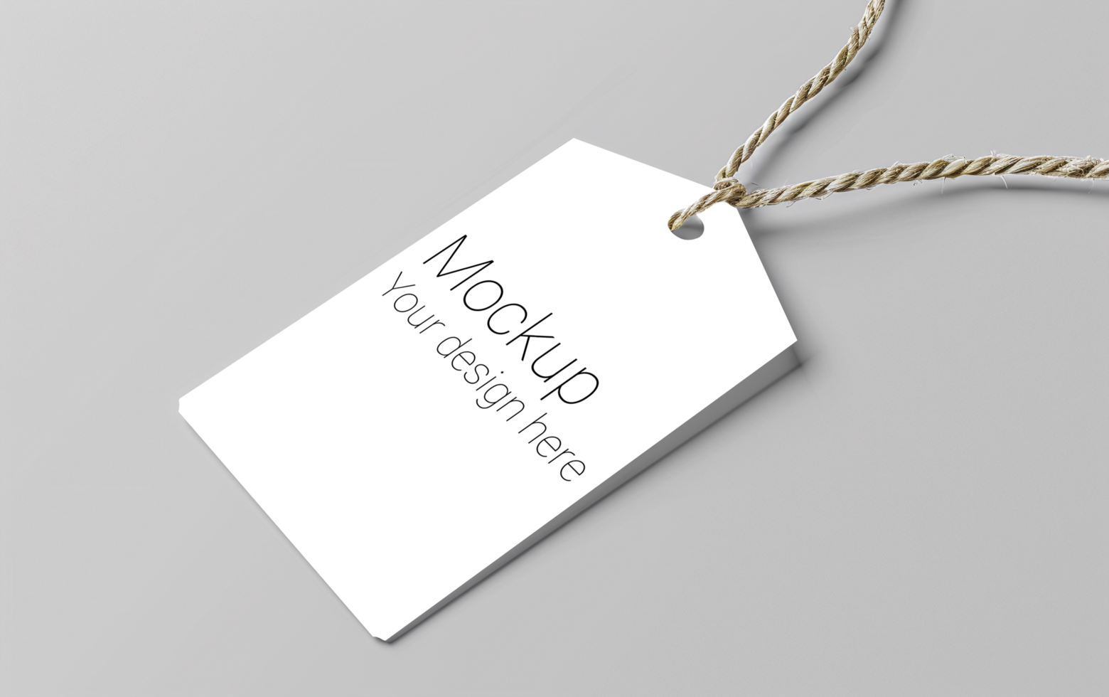 Mockup of label tag with rope on gray background psd