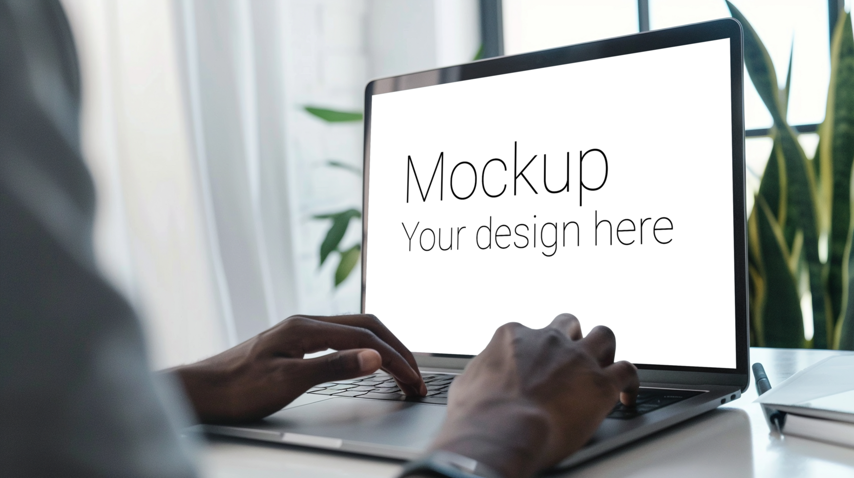 Mockup of black laptop with hands on it psd