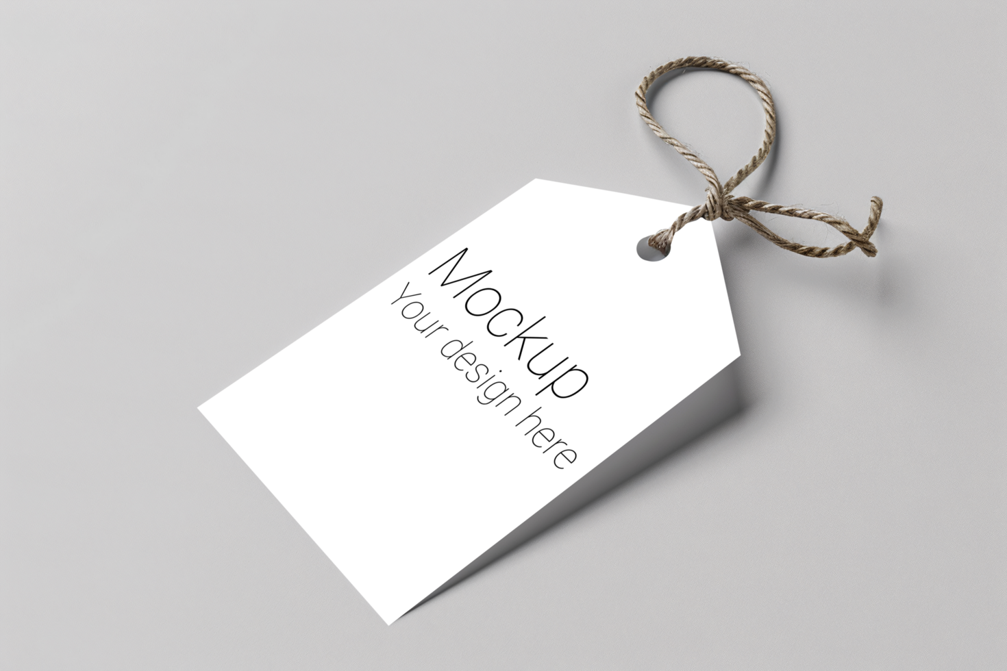 Mockup of label tag with rope on gray background psd