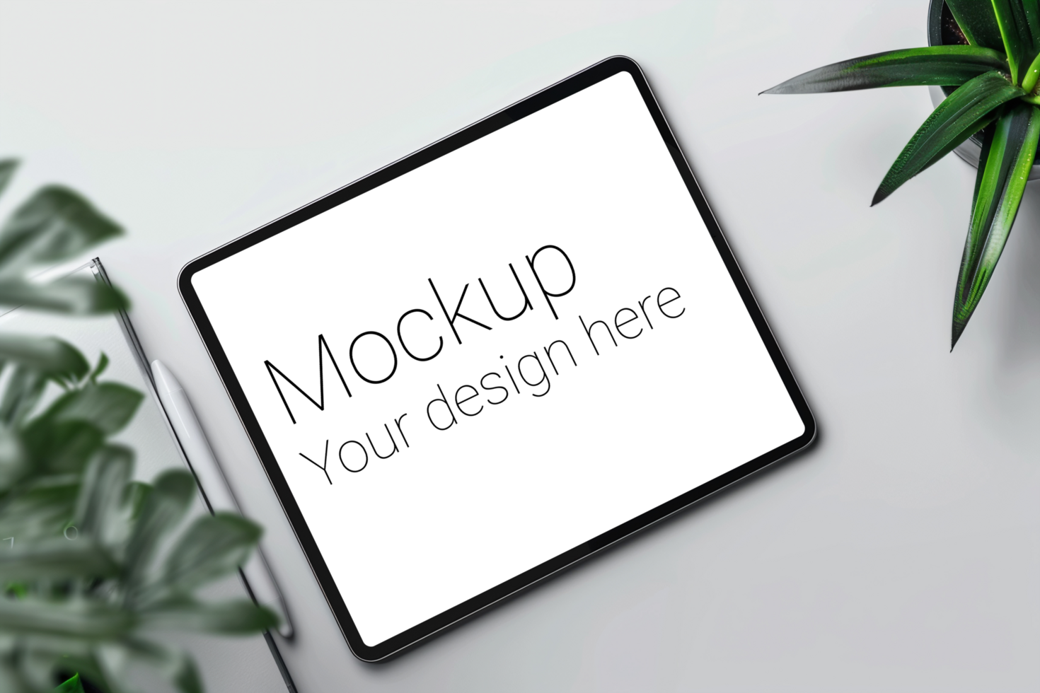 Mockup of black tablet on gray background with plants psd