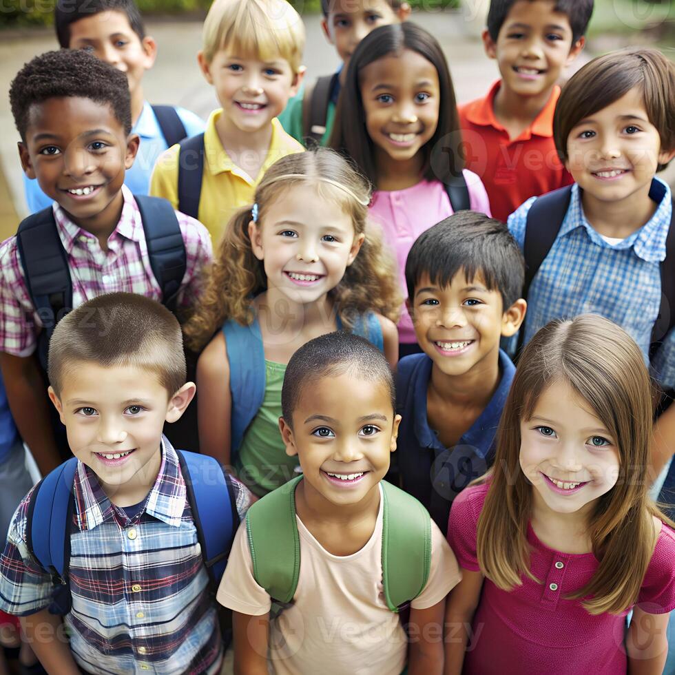 Group of Happy Schoolchildren in Colorful Sweaters on Background photo